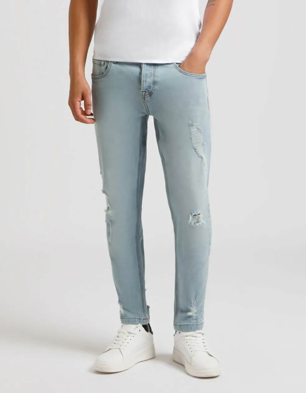 Jeans skinny fit con strappi