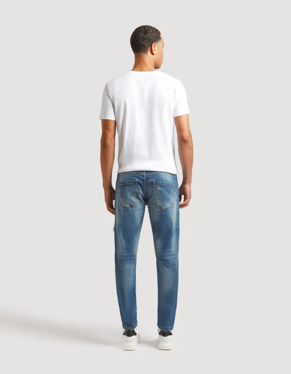 Jeans skinny fit con strappi