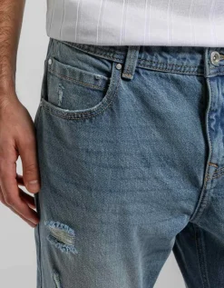 Jeans slim fit con strappi