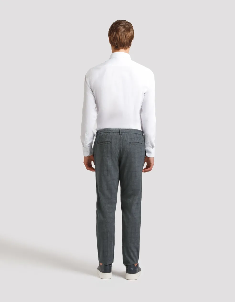 Pantaloni chino con fantasia a quadri