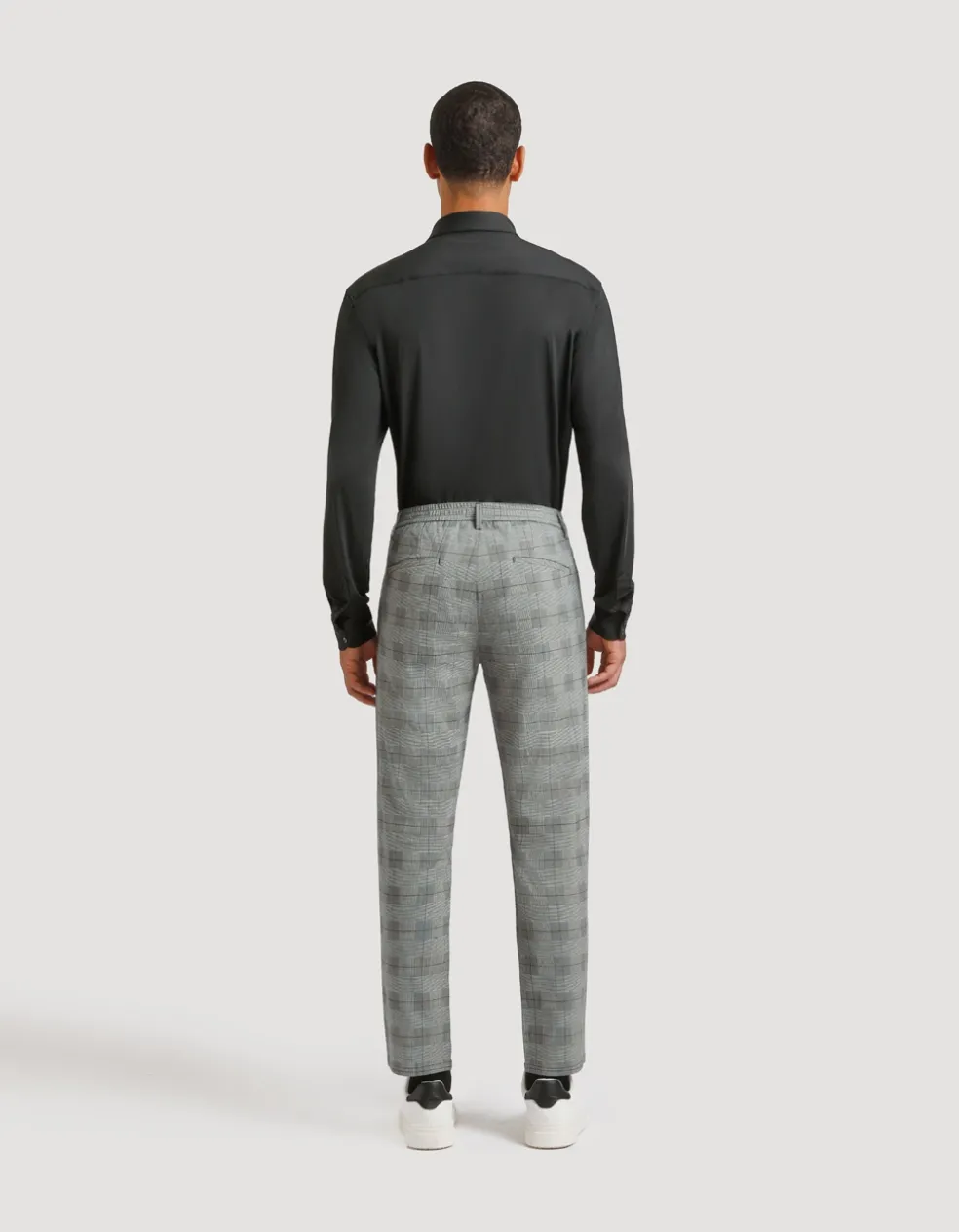 Pantaloni chino con fantasia a quadri