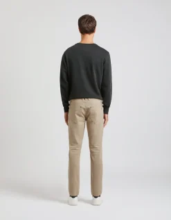 Pantaloni cinque tasche in cotone con strappi