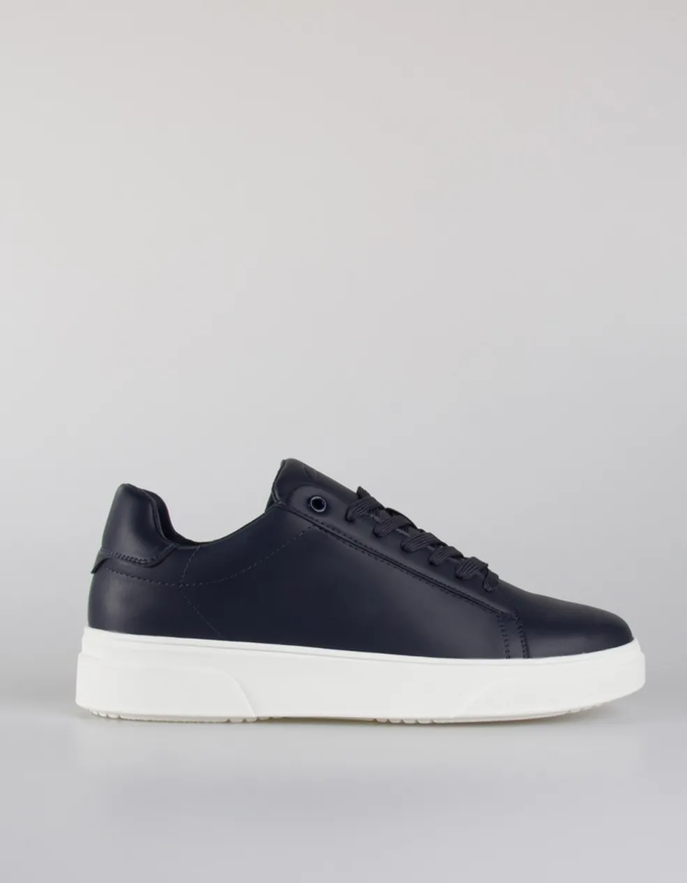 Sneakers effetto pelle