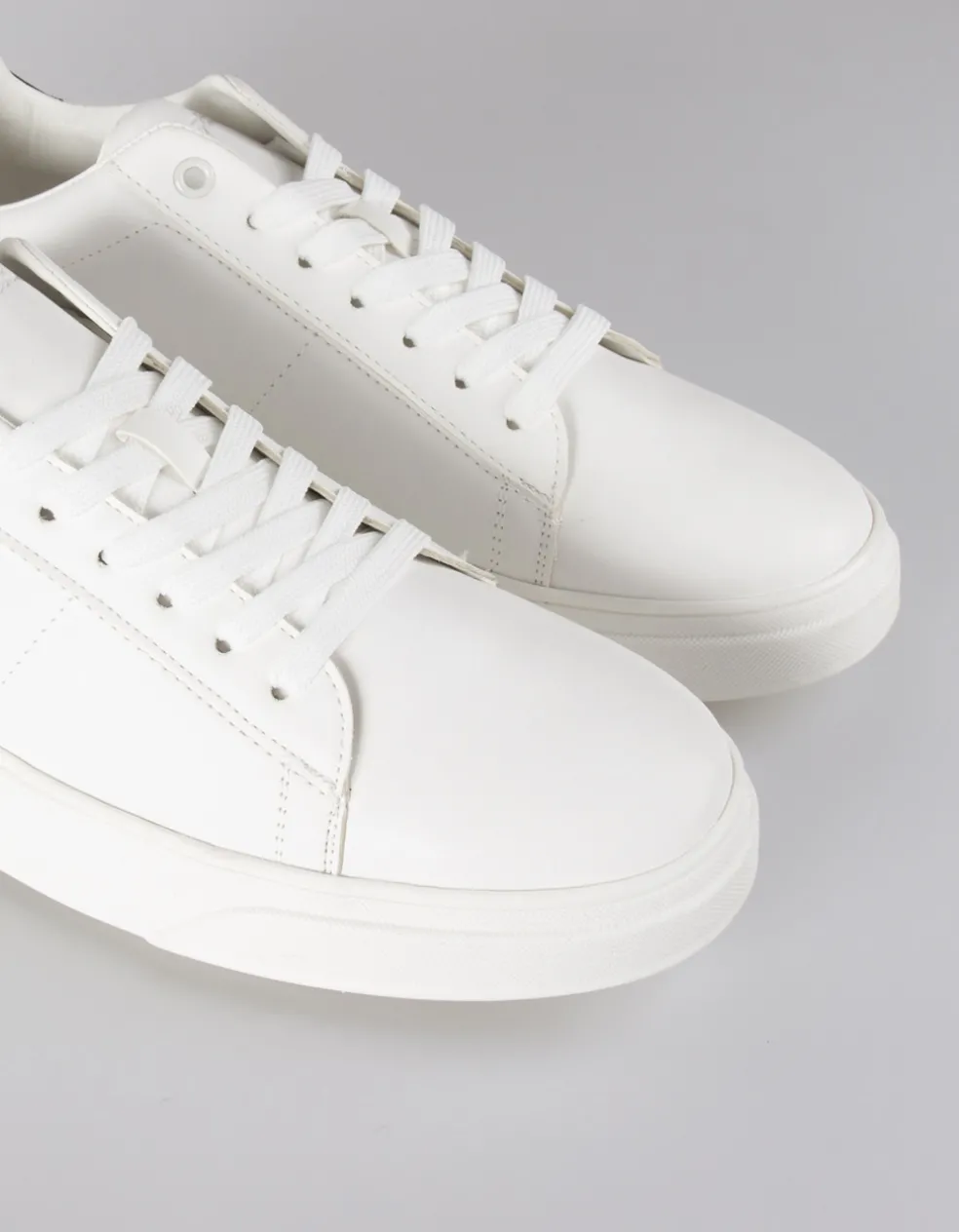 Sneakers effetto pelle
