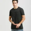 T-shirt con stampa a rilievo