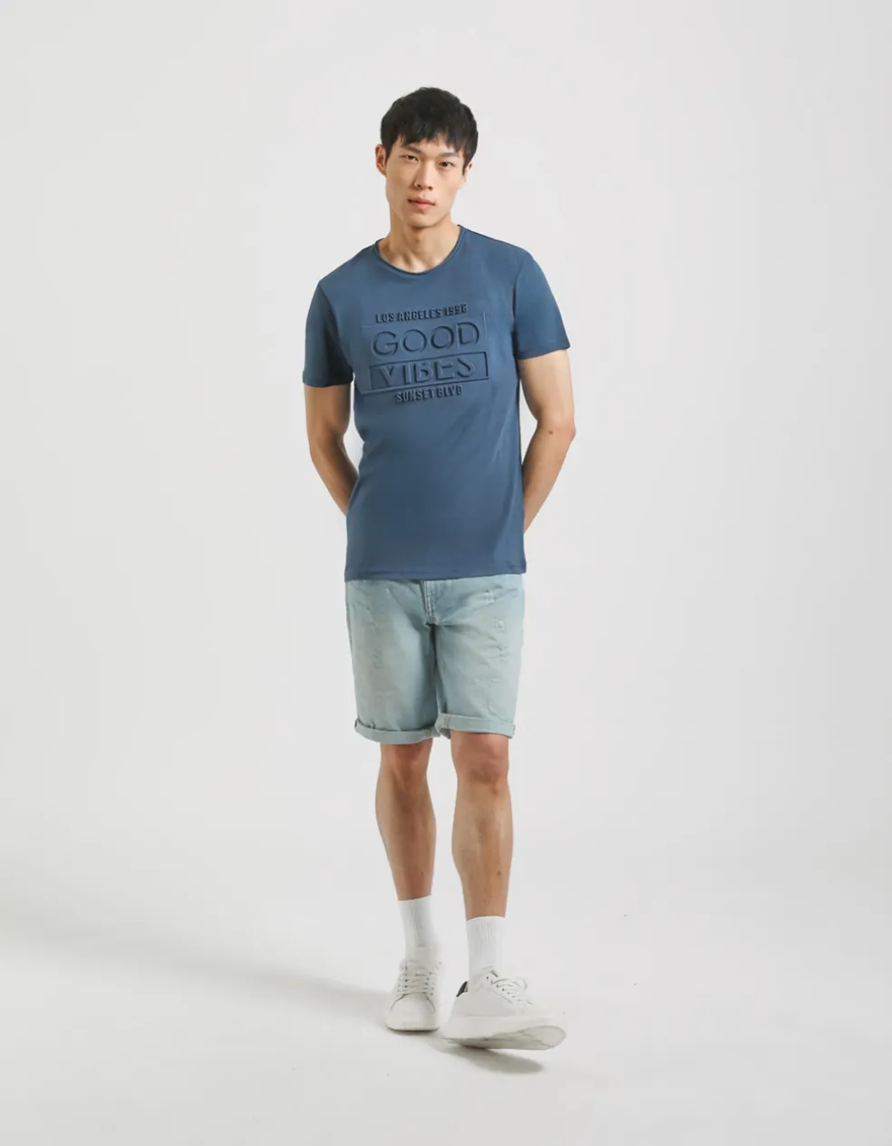 T-shirt con stampa a rilievo