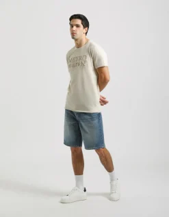 T-shirt con stampa a rilievo